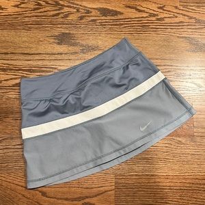Nike dri fit skort, size small, gray w/white stripe, great condition